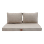 Finition et coutures coussin beige chiné noir