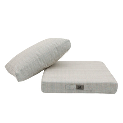 Détail tissu coussin beige chiné turquoise