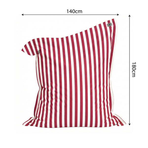 Ambiance jardin avec pouf rouge