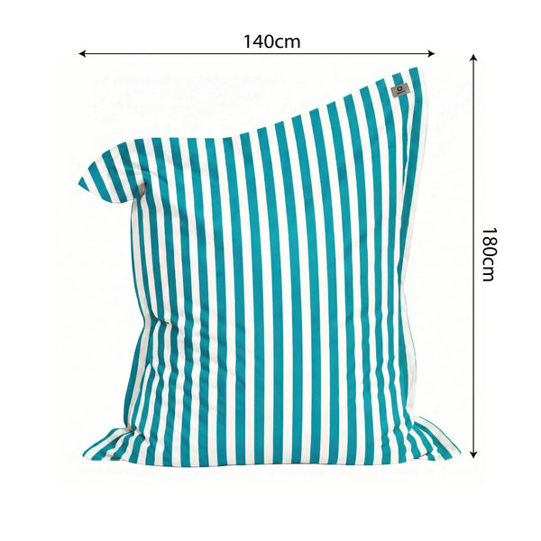Ambiance jardin avec pouf turquoise