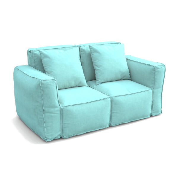 Dos sillones modulares Azul Caribe unidos con cremallera en un sofá de 2 plazas