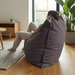 Détail tissu pouf gris carbone