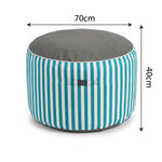 Ambiance jardin avec pouf turquoise