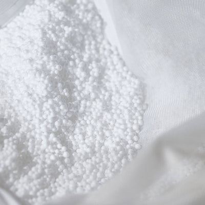 Pouf extérieur géant Déco Arts bleu pétrole, déhoussable et imperméable, garni de billes, idéal pour piscine ou terrasse.