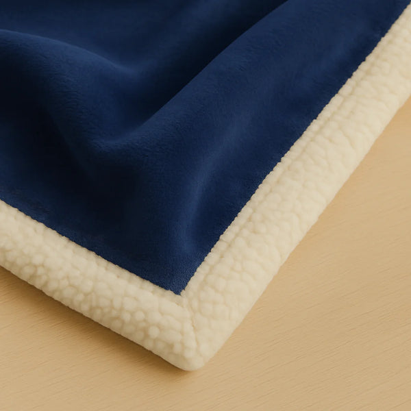 Ambiance jardin avec plaid bleu marine