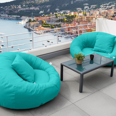 Pouf extérieur flottant pour piscine, XXL 140x120 cm en tissu Olefin bleu Caraïbes, avec pompe incluse, conçu par Deco-arts.fr.