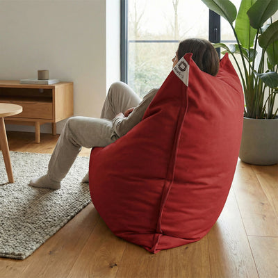 Détail tissu pouf rouge piment