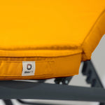 Matelas bain de soleil jaune miel pour transat, déhoussable et imperméable, dimensions 185x60 cm, confortable et pratique.